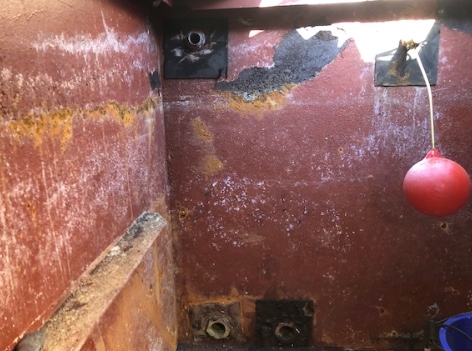 failed coating underneath tank liner